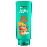 Acondicionador Garnier Fructis Stop Caída Crece Fuerte con vitamina C° que reduce la caída del pelo con formula vegana